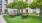 a courtyard with tables and chairs