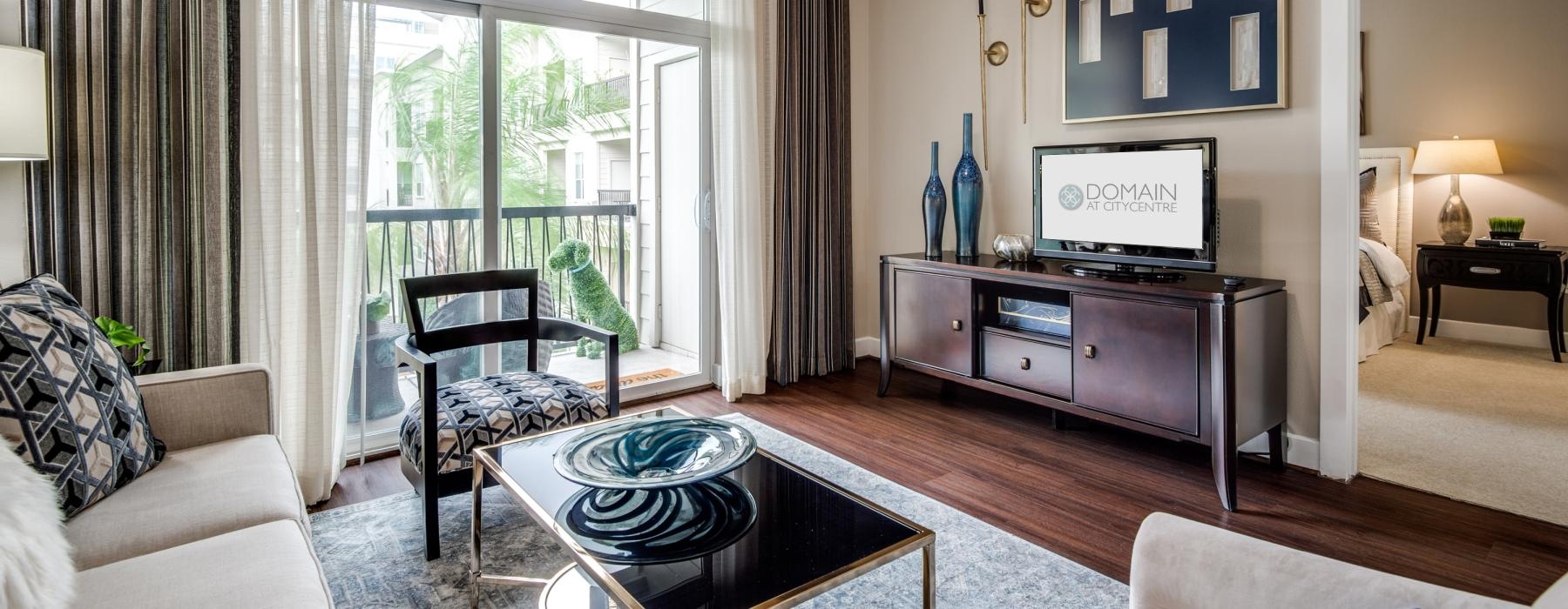 a living room with a tv and a couch