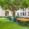 a courtyard with tables and chairs